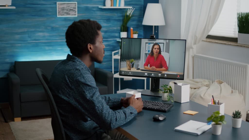 Remote Jamaican worker on video call